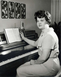 Frances Monson playing the piano.